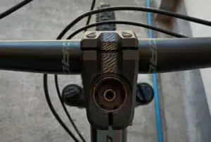 Align the handlebar with the frame and raise it at your preferred height.