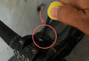 adjusting handlebar using Allen wrench