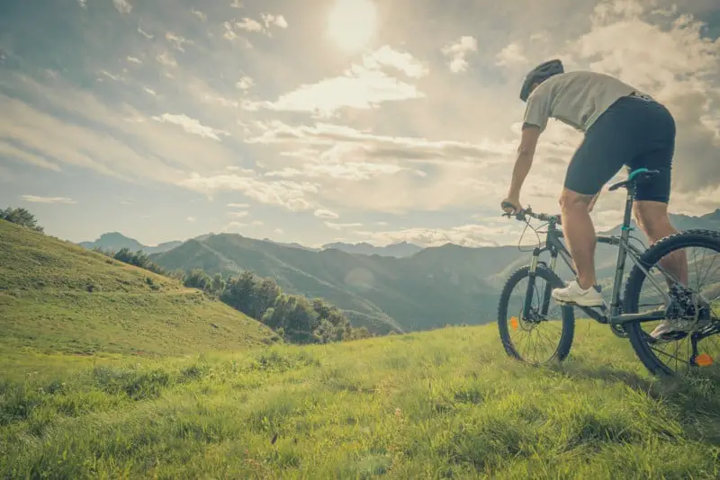 Man Riding His Bike On A Sunny Day