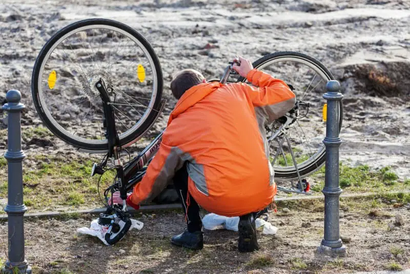 Man Fixing His Mountain Bike