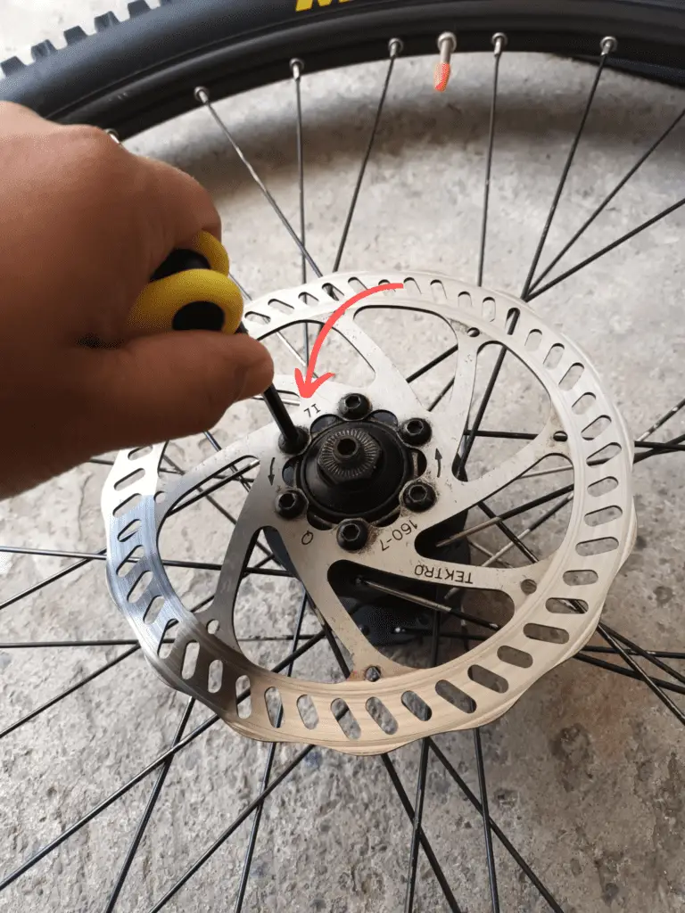 mounting and connecting the rotors to the hubs.